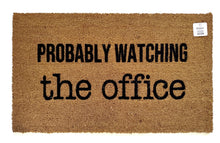 Probably watching the office doormat