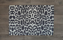 leopard under mat