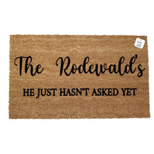 He Just hasn't asked yet last name doormat