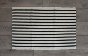 Off white stripe under mat